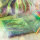 Bunte Zeugnismappe im DIN A4 Format mit 10 Hüllen und Dinosaurier-Design