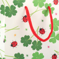 Lacktasche mit Glücksklee-Motiv in Größe S (16 x 12 x 6 cm) aus FSC-Mix-Papier mit glänzender Oberfläche